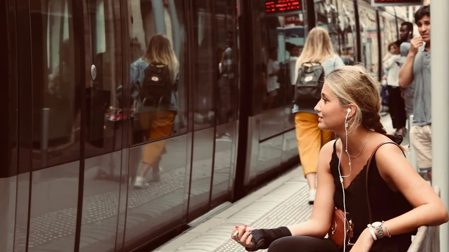 The %product_count% Best Wireless Earbuds 2 Person wearing earbuds during daily commute, checking battery life and usage