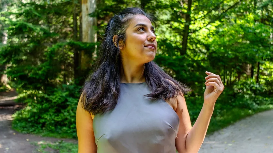 Shokz OpenFit Air 2 Earbuds Launch with 20 Percent Weight Reduction: What Buyers Should Know 2 person wearing earbuds outdoors running