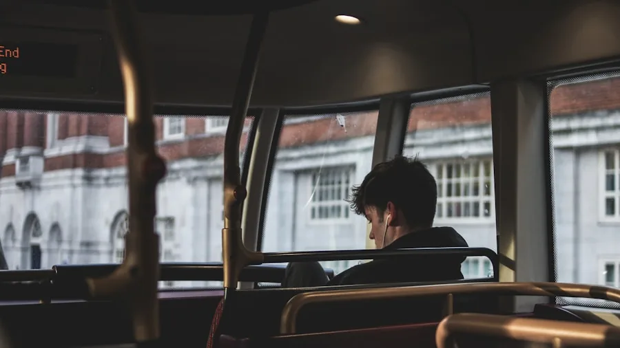 Person wearing earbuds while commuting, focused and relaxed in urban environment