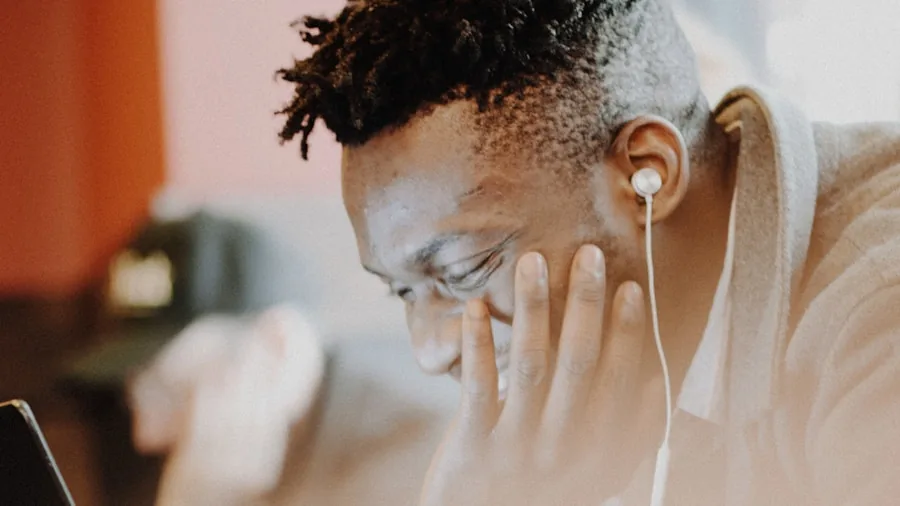 Plaud One Earbuds Launch with Built-In Recording and AI: What Shoppers Need to Know 3 person wearing earbuds working laptop