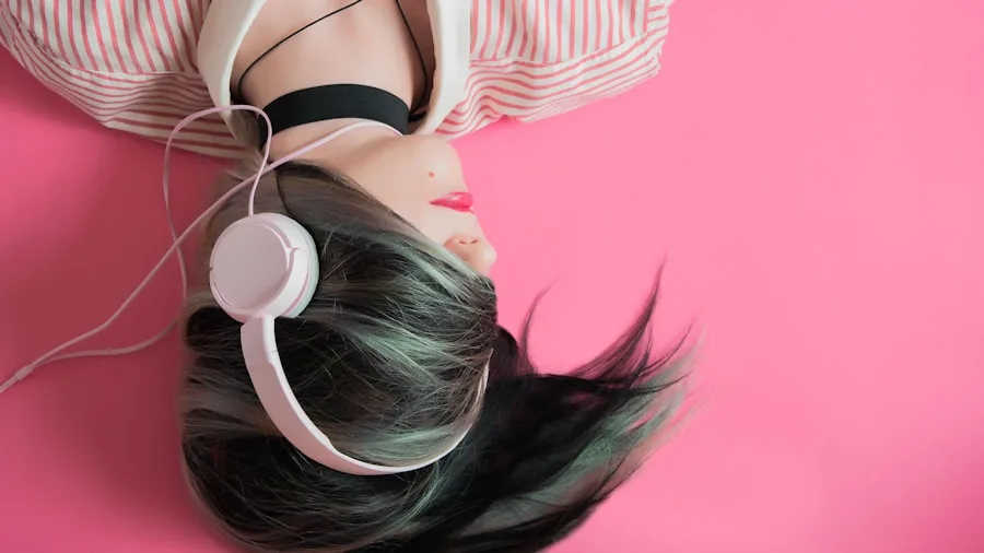 Person wearing headphones enjoying music with eyes closed, experiencing high-quality sound