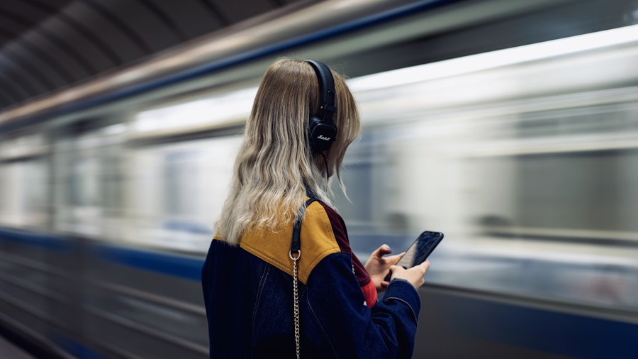 Person wearing headphones on public transportation, enjoying music in a noisy urban environment