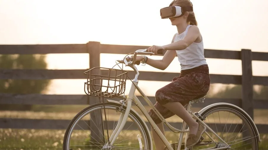 The %product_count% Best VR Headsets 4 Person wearing VR headset exploring immersive digital gaming environment in home setting