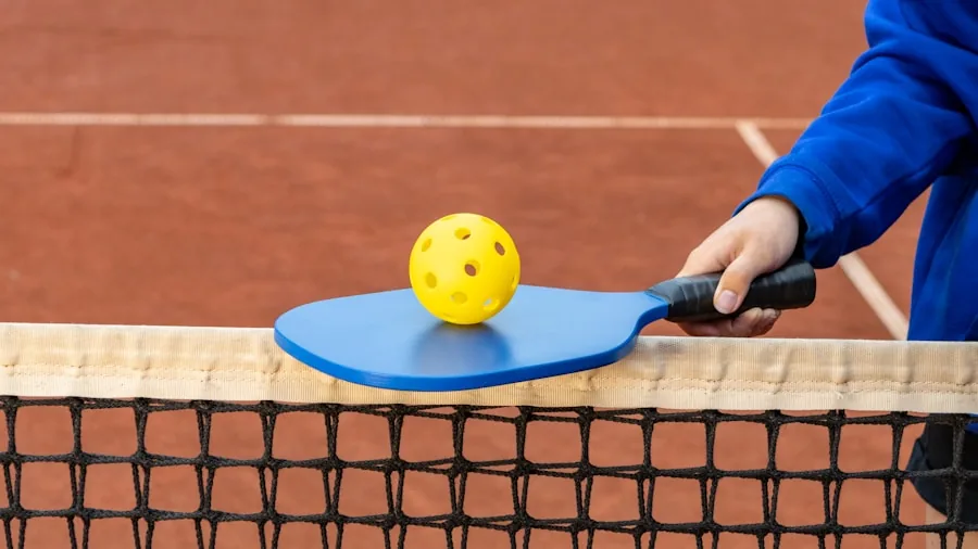 Player in action on outdoor pickleball court with athletic footwear, demonstrating proper stance and movement on asphalt surface