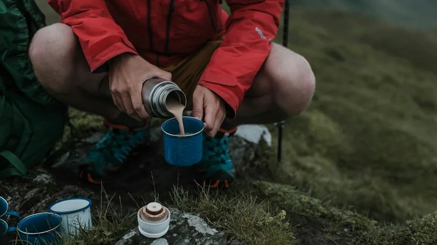 7 Tips for Making Perfect Cowboy Coffee at Home 2 pouring coffee into mug outdoor
