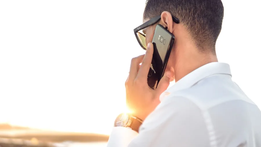 professional taking call with earbuds