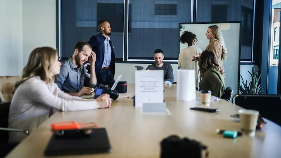 Apple's Wired EarPods Still Have a Place: What Shoppers Should Know in 2025 3 professional using earbuds meeting