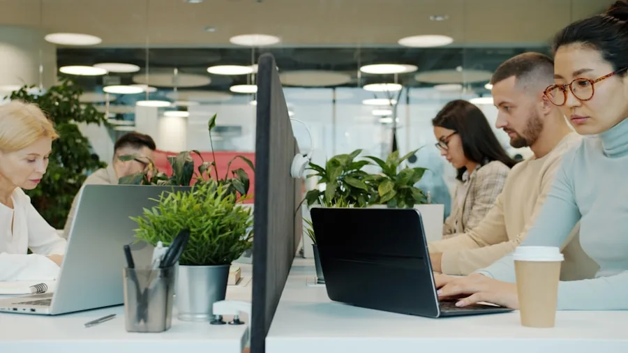 Professional working at wooden desk with wireless keyboard in modern home office setting