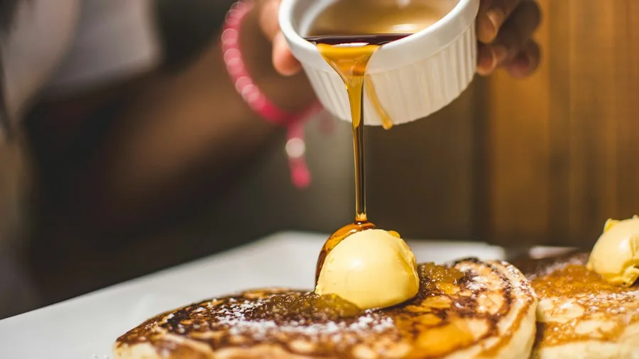 Pumpkin Pie Latte Syrup Takes Over Coffee and Breakfast Tables This Fall 3 pumpkin pancakes maple syrup