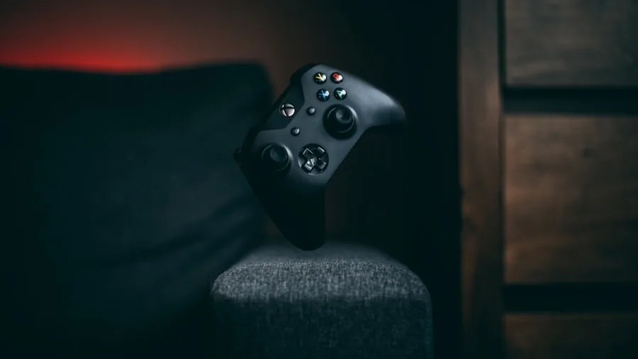 Roku OLED TV Launch: What Shoppers Need to Know About New Budget Options 3 remote control and gaming setup