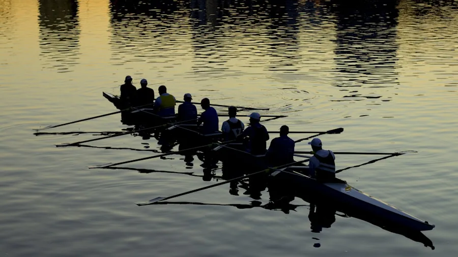 Group Workout Benefits: What Brain Science Reveals for Your Fitness Routine 3 rowers training in unison team