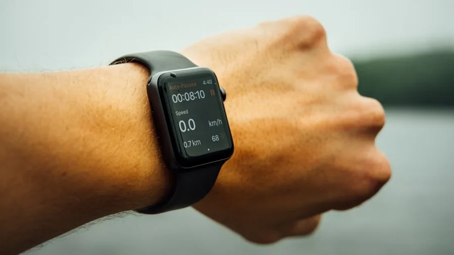 Wahoo Launches Apple Watch App for Workout Tracking and Training What Shoppers Should Know 2 runner checking heart rate metrics on wrist