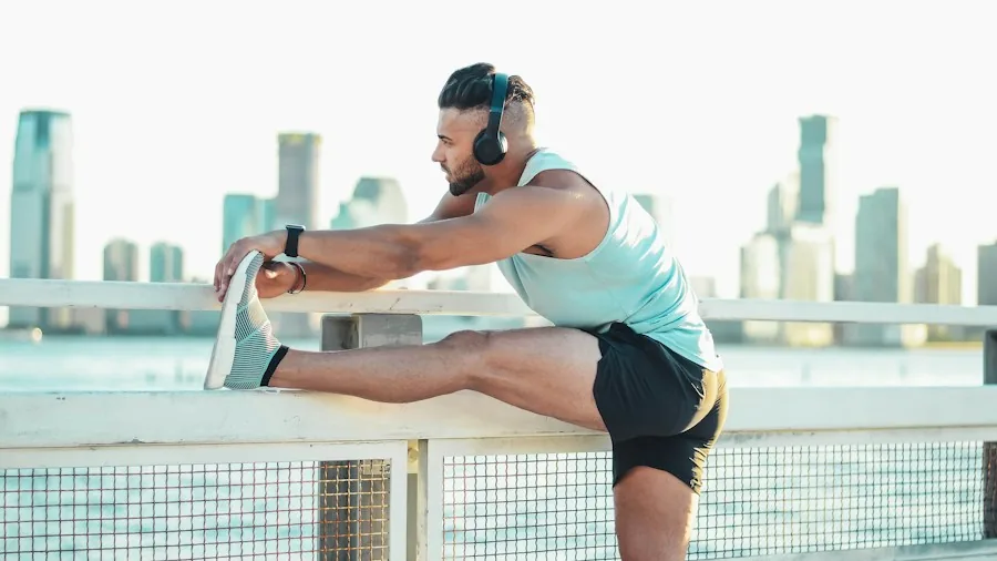 Tempo Run Workout Guide: How to Build Speed and Endurance at Home 2 runner dynamic stretching warm up