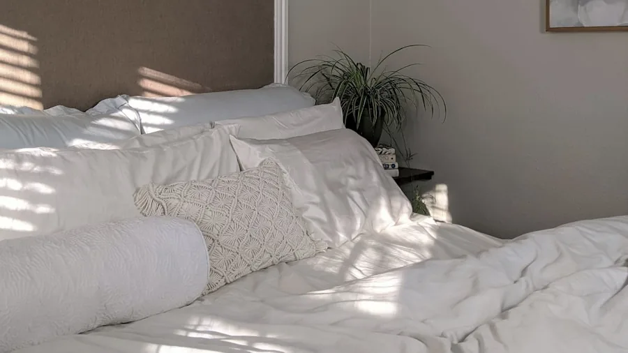 Serene bedroom interior with comfortable bedding and soft lighting for peaceful rest
