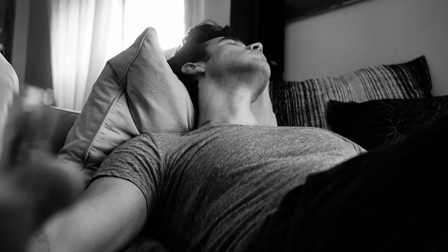 Side sleeper resting peacefully on pillow in bed, demonstrating proper sleeping posture