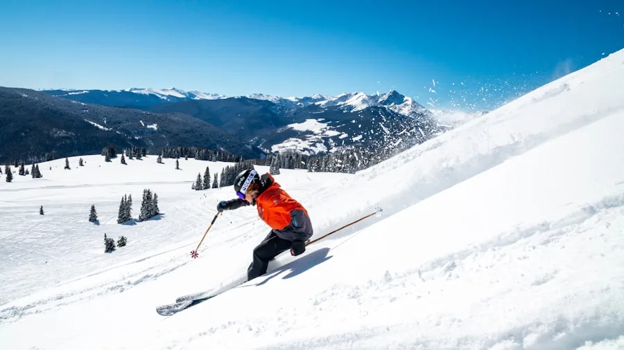 The %product_count% Best Ski Jackets 2 Skier on snowy slope wearing winter gear in alpine mountains