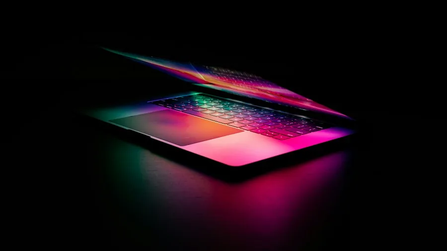 MacBook Ultra Touchscreen Laptop Coming in October What Shoppers Should Know 3 sleek aluminum laptop OLED screen
