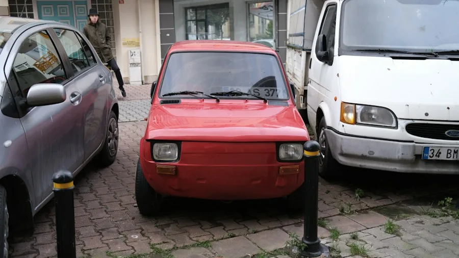 Iconic French City Car Returns as Electric Vehicle: What Buyers Should Know 3 small compact car parking city street