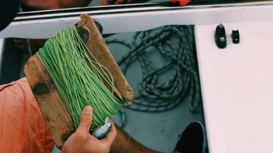 Someone carefully installing wiring and electronic components in a vehicle during a DIY installation project