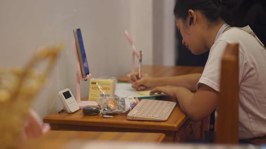 student studying with laptop