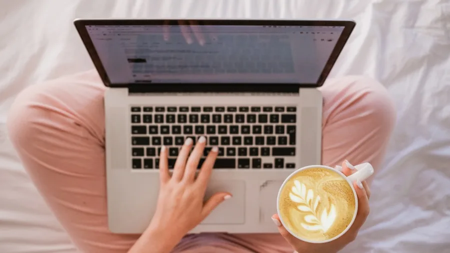 Dell Laptop Deals and Coupon Codes for July 2026 What Buyers Should Know 2 student typing laptop coffee