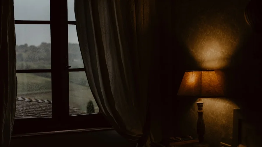Sunlight streaming through bedroom window with person adjusting curtains for temperature control