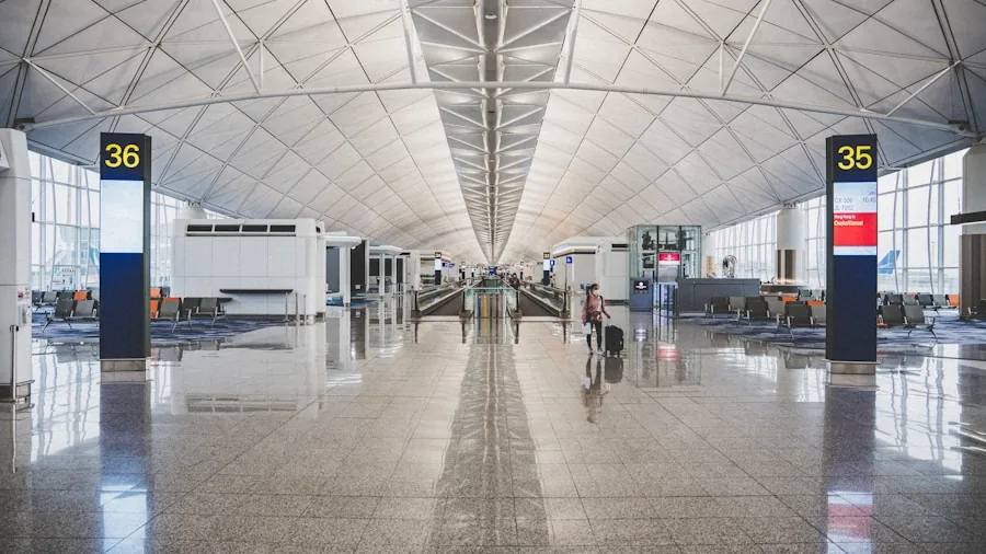 The %product_count% Best Checked Luggage 3 Traveler maneuvering spinner luggage through busy airport corridor with ease