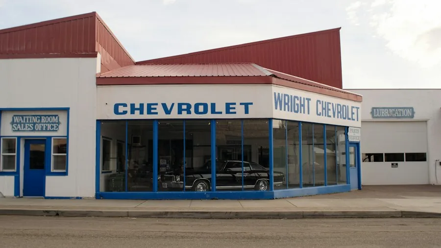 Top 25 Bestselling Cars and Trucks of 2026 What Buyers Should Know 3 truck buyers at dealership
