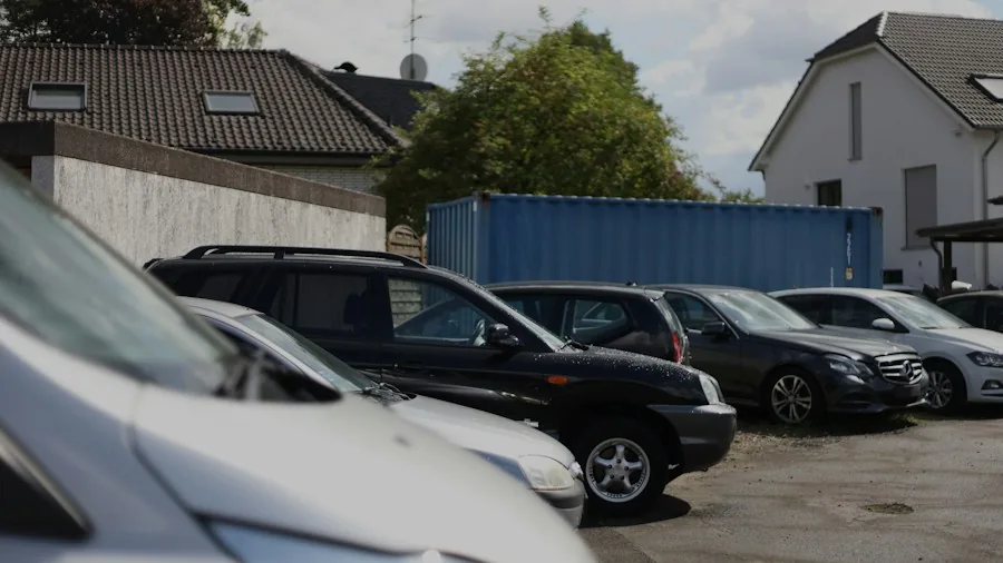 Used Electric Vehicles Are Now Outselling Gas Cars: What It Means for Your Next Purchase 3 used cars parked outdoor lot