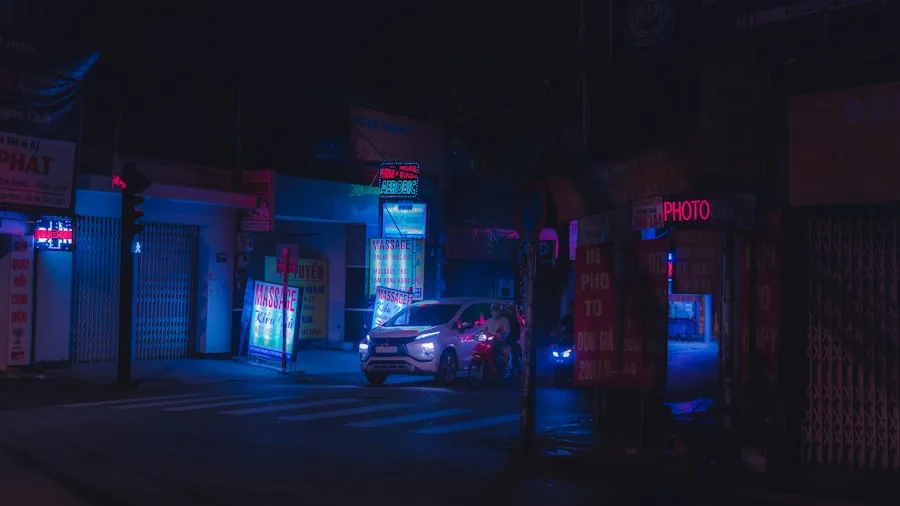 Vehicle parked on residential street at night, illustrating parking security concerns and monitoring needs