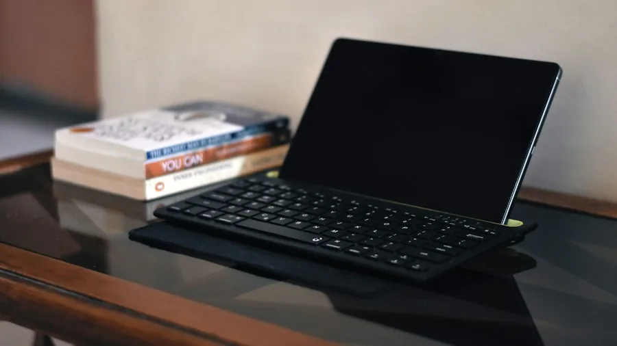 Windows tablet with keyboard on desk