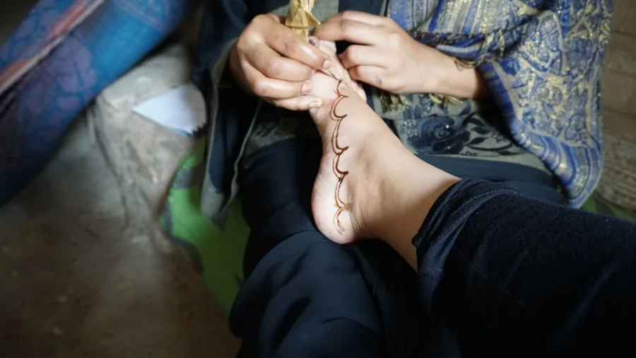 Woman carefully measuring her foot size to ensure proper shoe fit and sizing accuracy