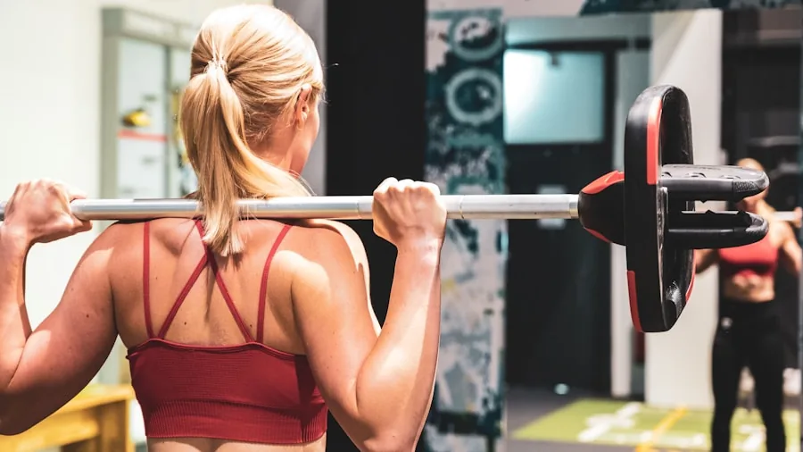 Viral Fitness Influencer Shares Full Body Workout You Can Do at Home 2 woman doing weighted squats