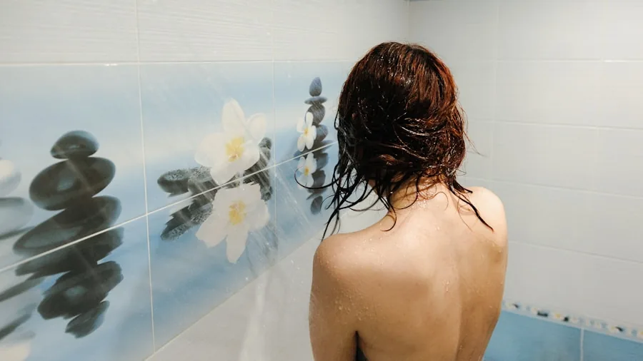 The 13 Best Shower Heads 4 Woman enjoying a refreshing shower in a modern bathroom with natural light streaming through the window