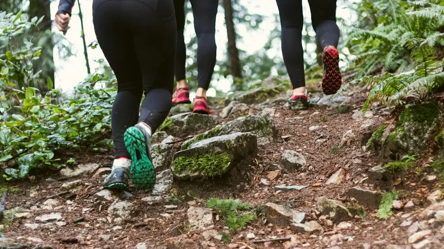 The %product_count% Best Hiking Shoes for Women 4 Woman hiking on forest trail with proper footwear support and cushioning