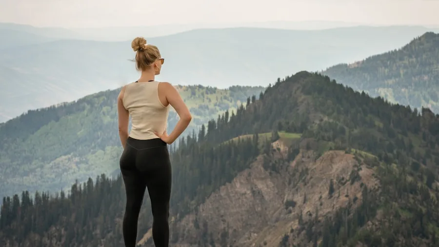 Woman hiking outdoors in athletic gear, staying active and comfortable during exercise in natural conditions