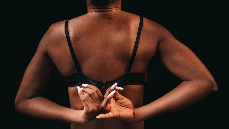 The %product_count% Best Sports Bras 3 Woman in athletic wear adjusting her sports bra straps while preparing for a workout