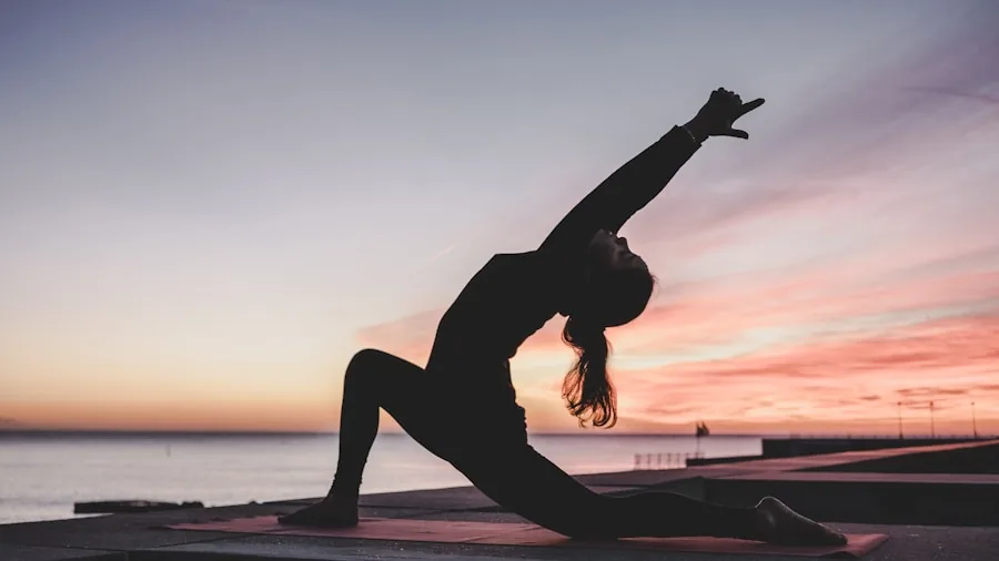 The %product_count% Best Sports Bras 2 Woman in athletic wear stretching during a yoga session focusing on flexibility and wellness