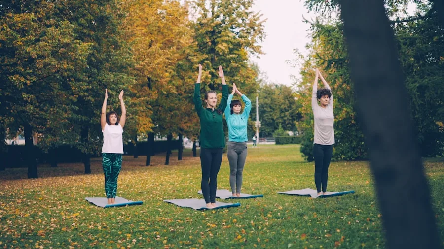 The %product_count% Best Yoga Pants 6 Woman in full-length leggings doing yoga stretch outdoors on grass during daytime