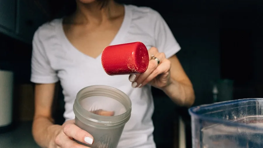 Woman making a smoothie in a bright kitchen during early morning routine