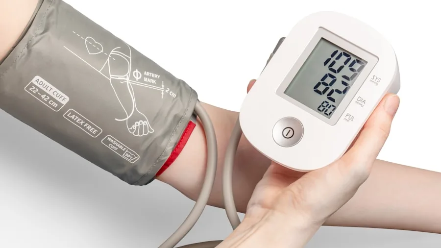 The %product_count% Best Blood Pressure Monitors 3 Woman measuring blood pressure on arm at home, healthcare monitoring lifestyle