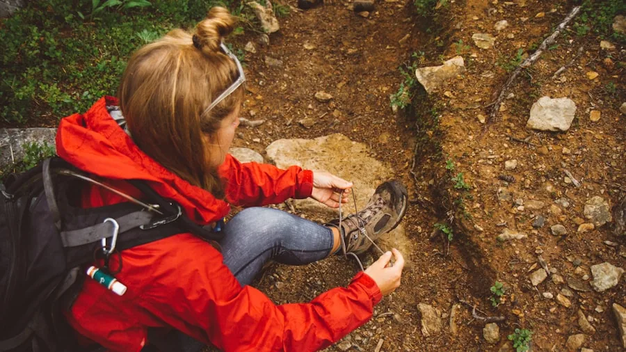 The %product_count% Best Hiking Shoes for Women 2 Woman measuring her feet in the afternoon to ensure proper hiking shoe fit and sizing