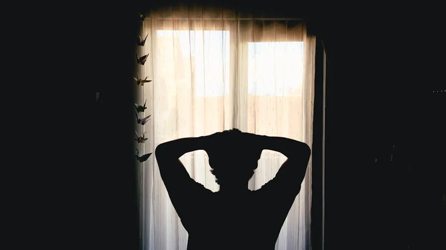 Woman opening blackout curtains in bedroom to let natural light in during morning