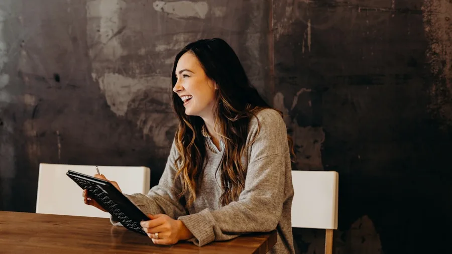 TV Privacy Concerns Surge as Makers Add Recording Features Without Consent 2 woman reading device terms and conditions carefully