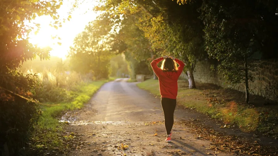 Woman walking confidently on outdoor path demonstrating proper posture and foot support