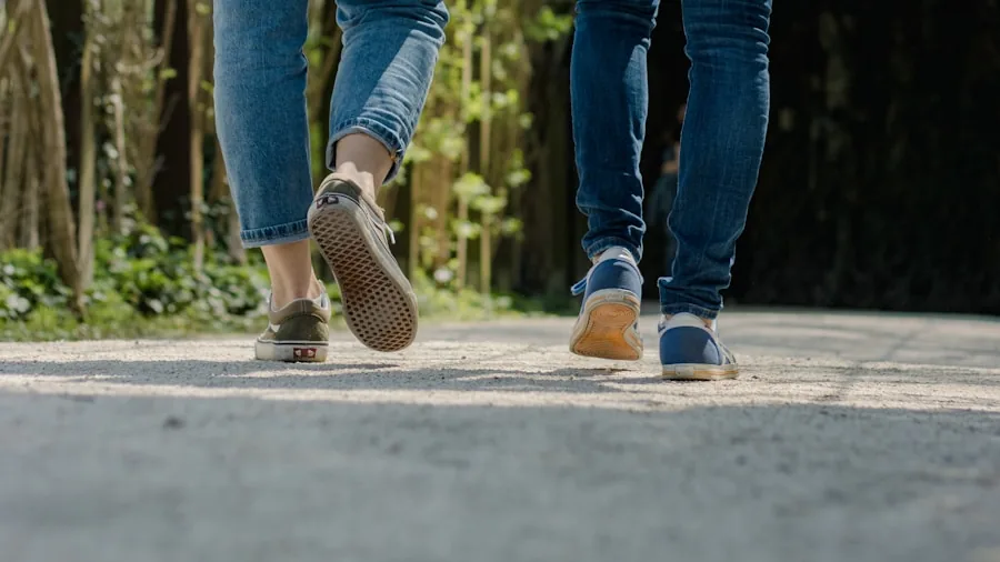 Woman walking on forest trail wearing comfortable walking shoes during daytime