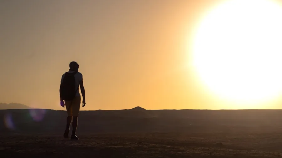 Woman walking on sunny path in light breathable clothing during warm weather