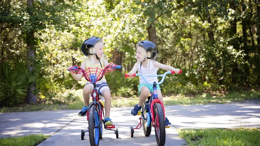 The %product_count% Best Balance Bikes 4 Young child wearing helmet learning to ride balance bike outdoors with parent supervision