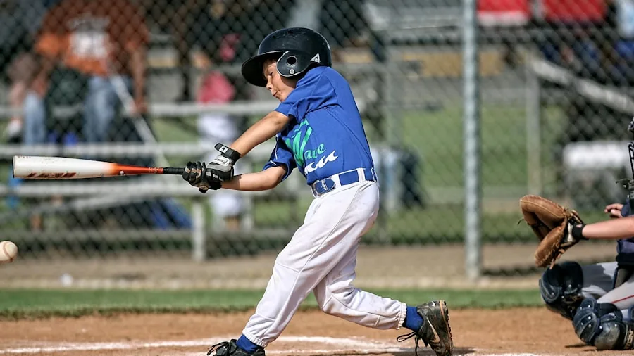 The %product_count% Best Baseball Bats 4 Youth baseball player in batting stance during practice, focusing on proper bat grip and swing mechanics